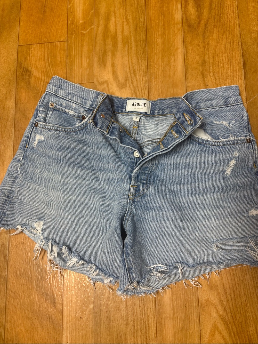 Agolde Light Wash Distressed Denim Cutoff Shorts
